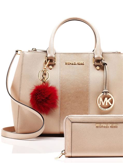 michael kors handbag with wallet|michael kors woman with bag.